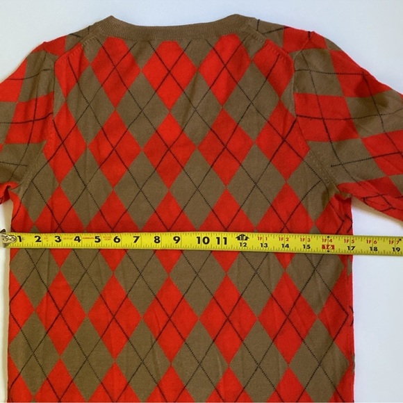 J Crew
Women’s 
Wool 
Medium 
V-Neck Argyle Sweater
Tan and Orange 
EUC - Picture 4 of 11
